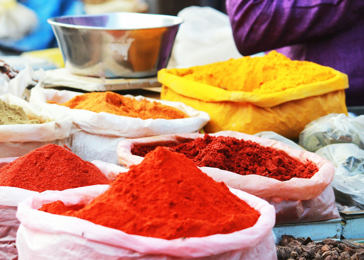 Colorful heaps of spices at a market stall